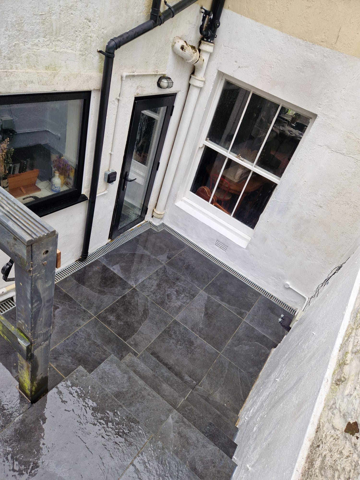 Grey slate-tiled rear patio