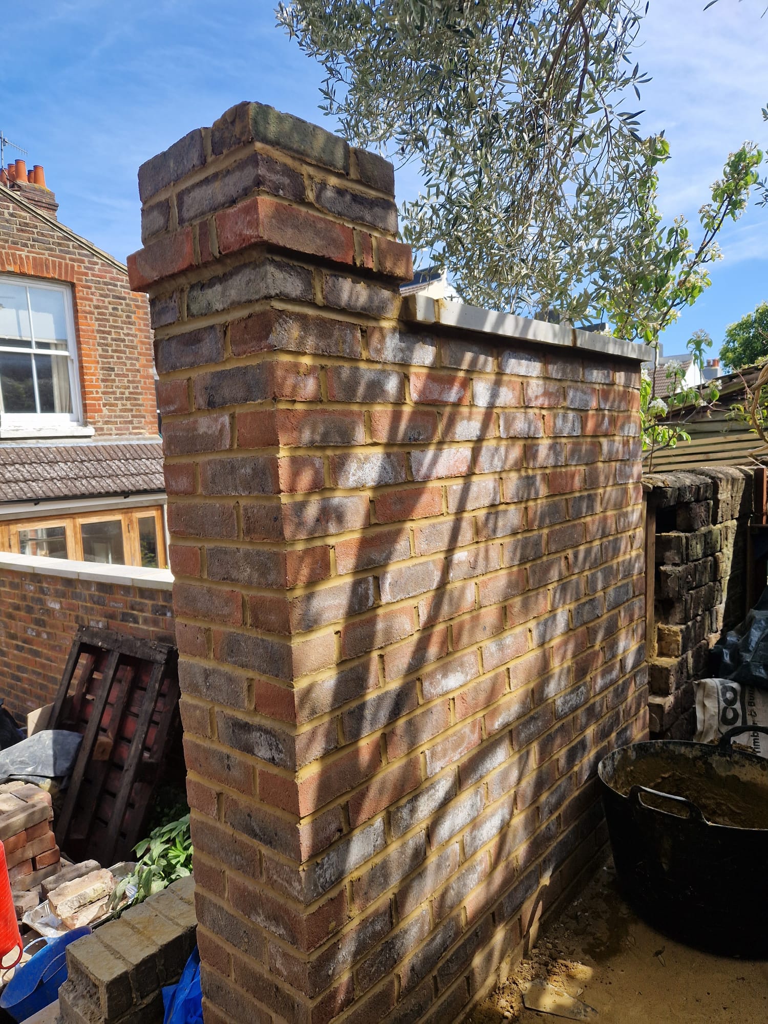 Tall brick chimney breast