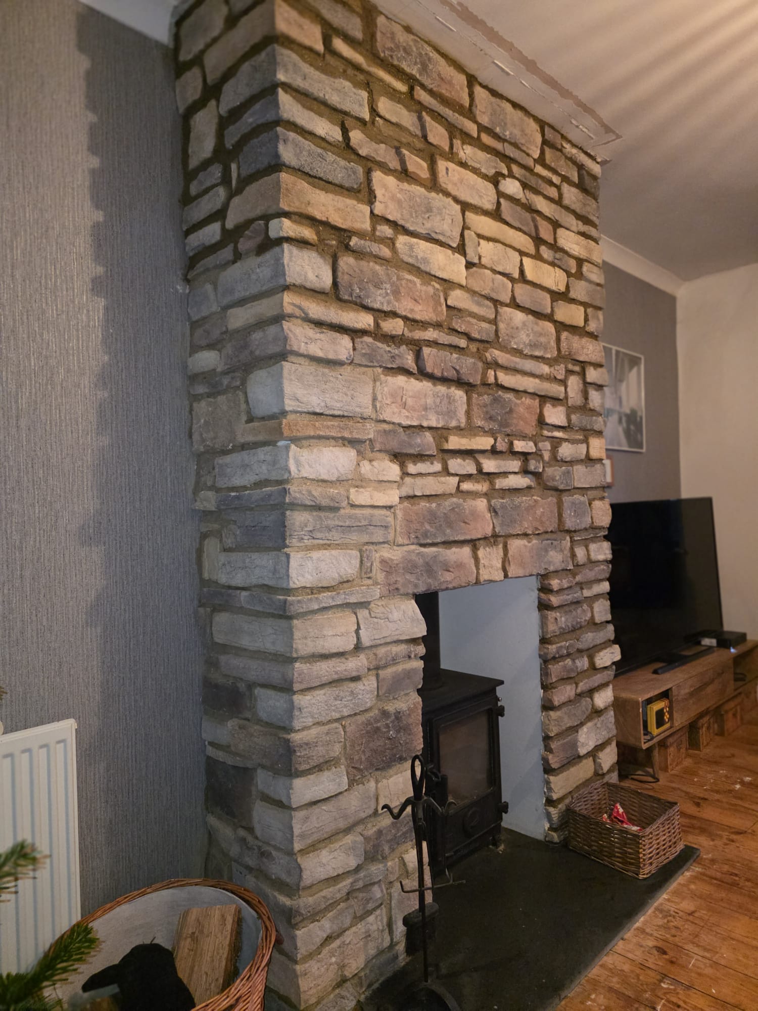 Tall stone fireplace breast